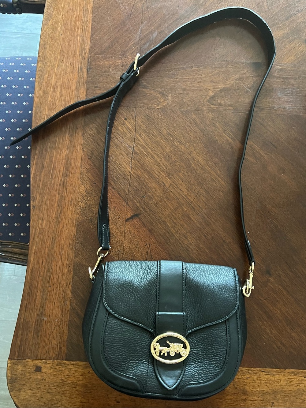 Coach Black Pebbled Leather Saddle Crossbody with Gold Horse Logo